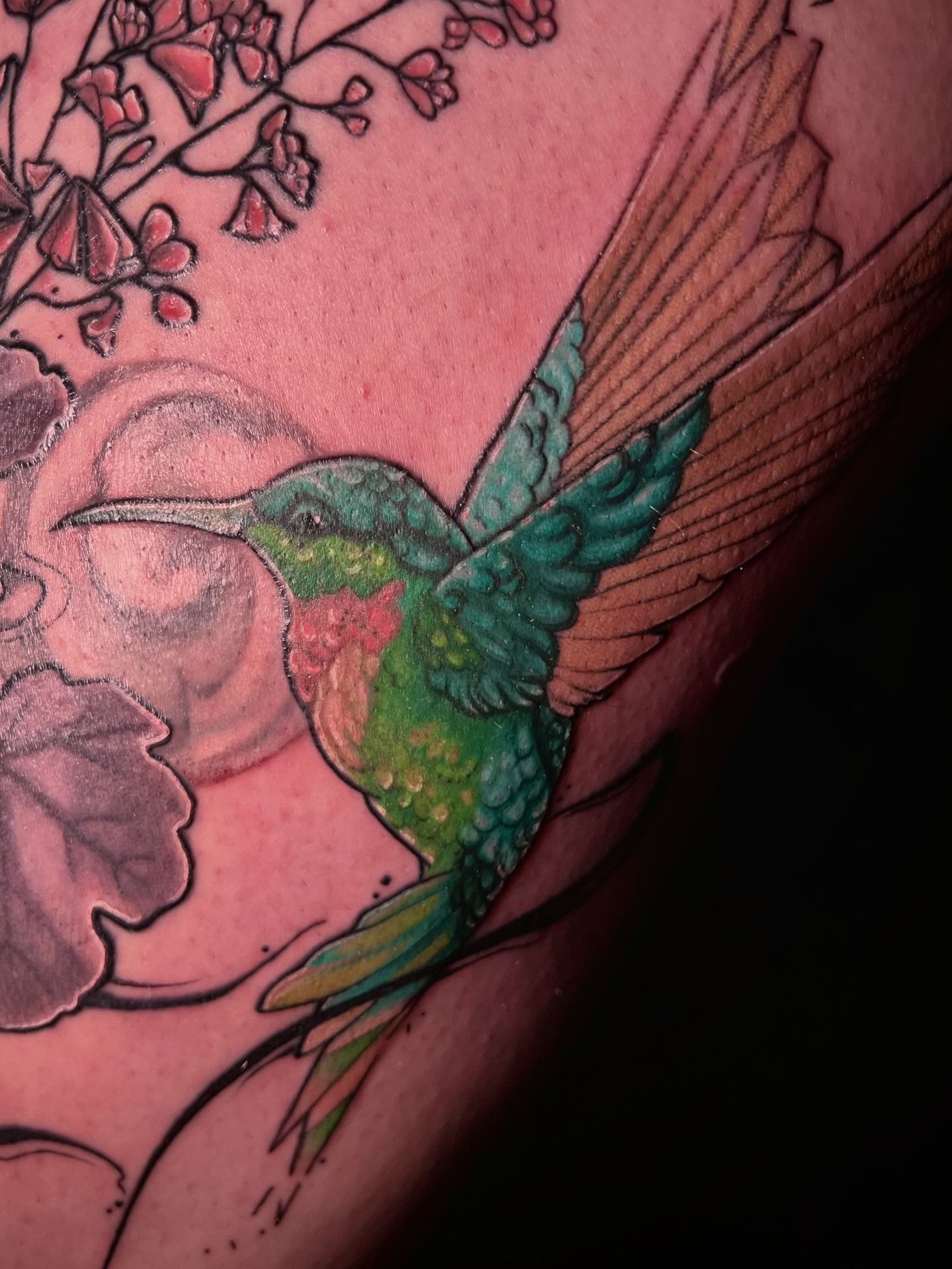 Hummingbird realism tattoo on the thigh by Em ✨PA Tattooer