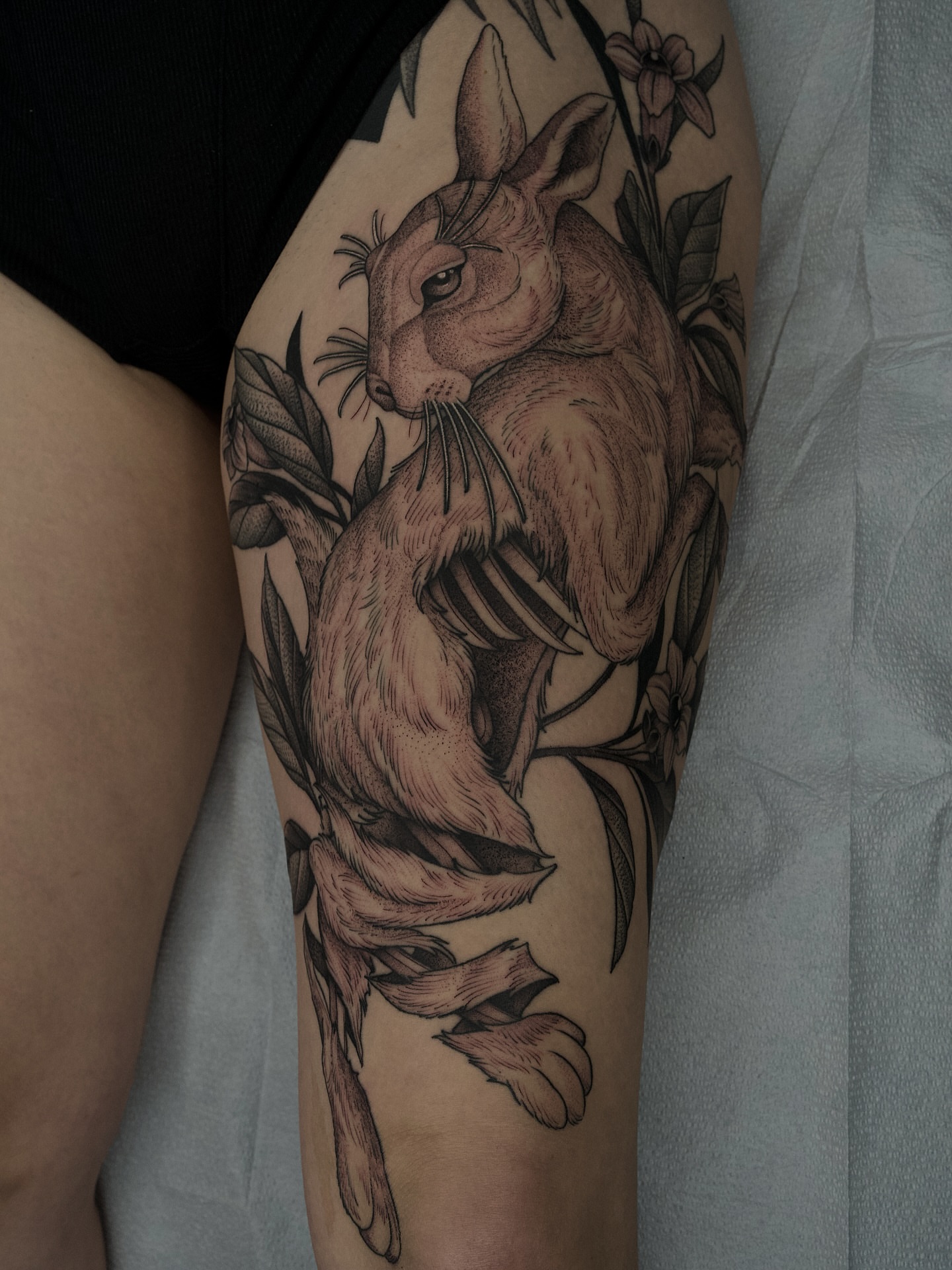 Rabbit realism tattoo on the forearm by Kyle Stacher - Blackwork Tattoos - Denver