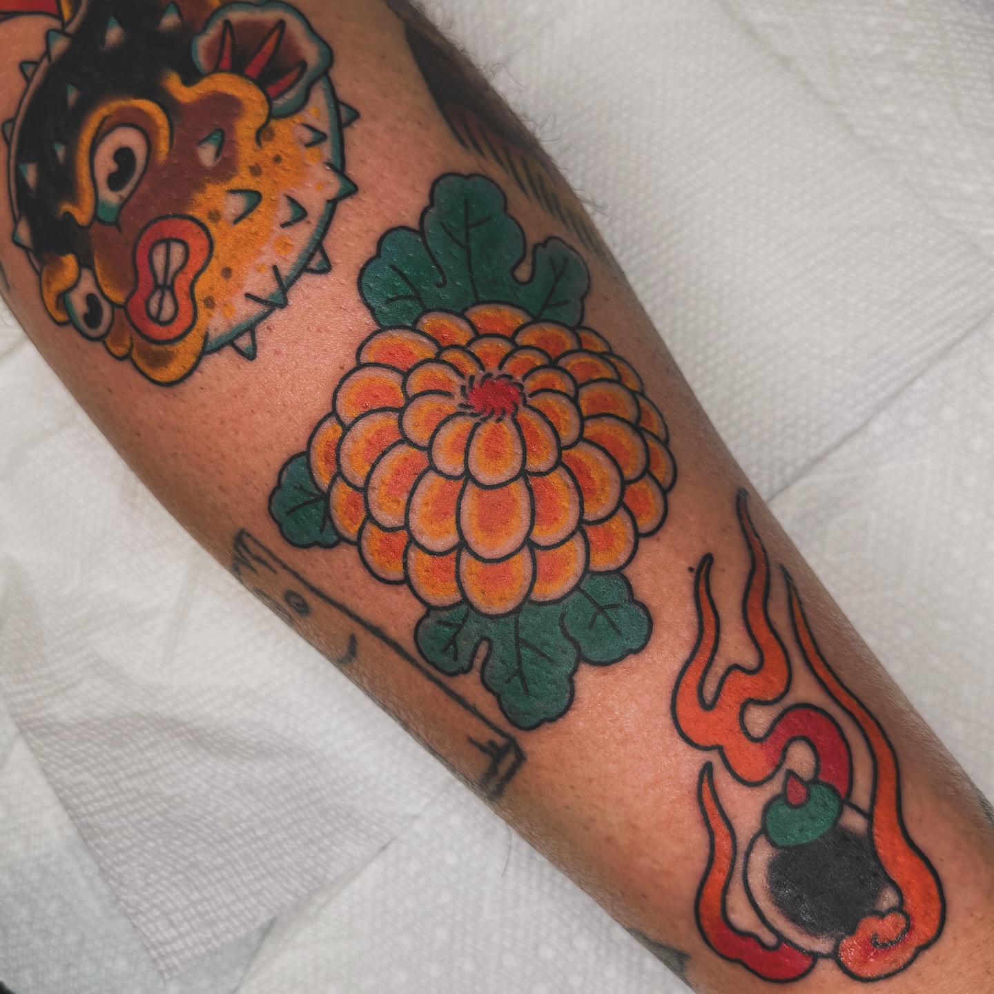 Chrysanthemum American traditional tattoo on the forearm by Liz Mercer ★ Tattooer - Raleigh NC