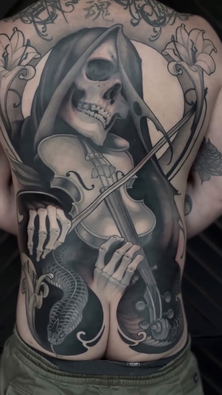 Tattoo by @michaeljtattoos — dark_realism, black_and_grey