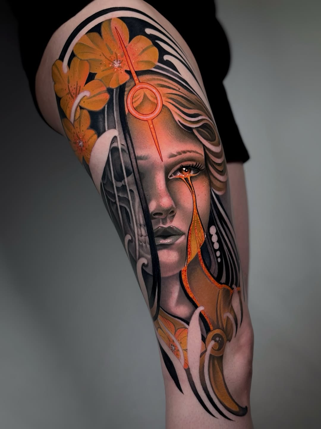 Woman with skull and flowers neo-traditional tattoo on the forearm by Aitor Arie, Roseville, California