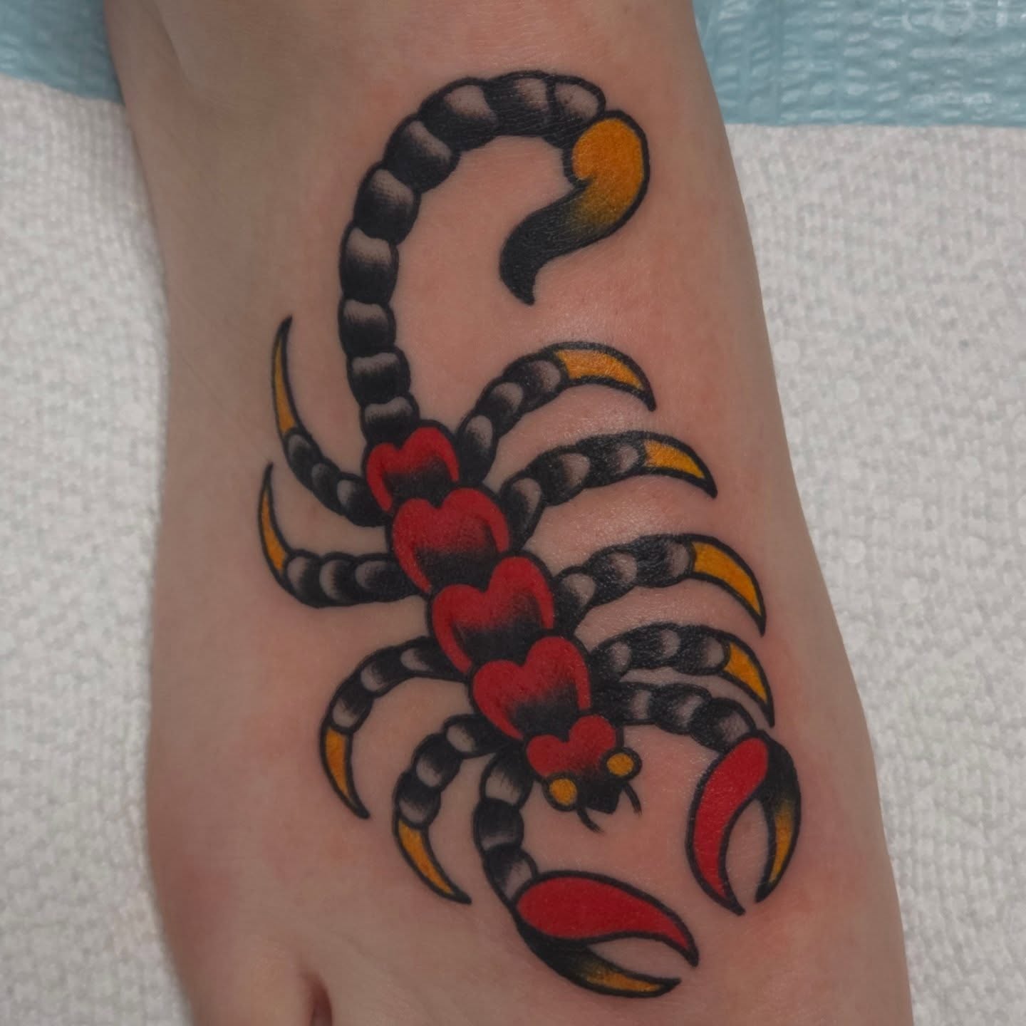 Scorpion American traditional tattoo on the forearm by Jared Green