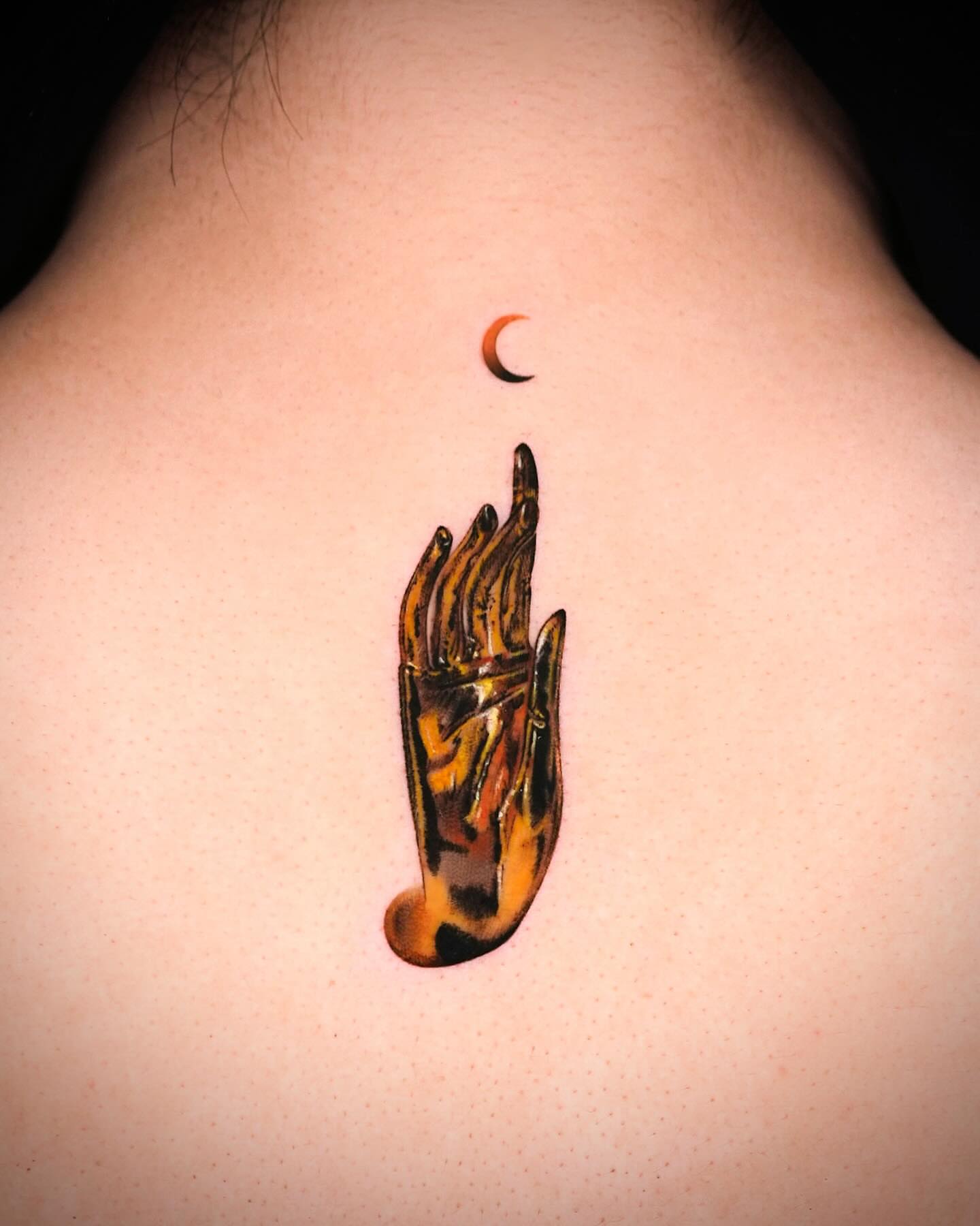 Hand with flame neo-traditional tattoo on the back by Rizn