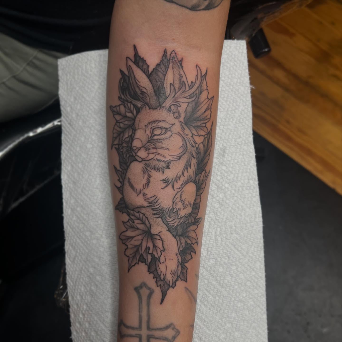 Lion black and grey tattoo on the forearm by Brooke, Kansas City, Missouri
