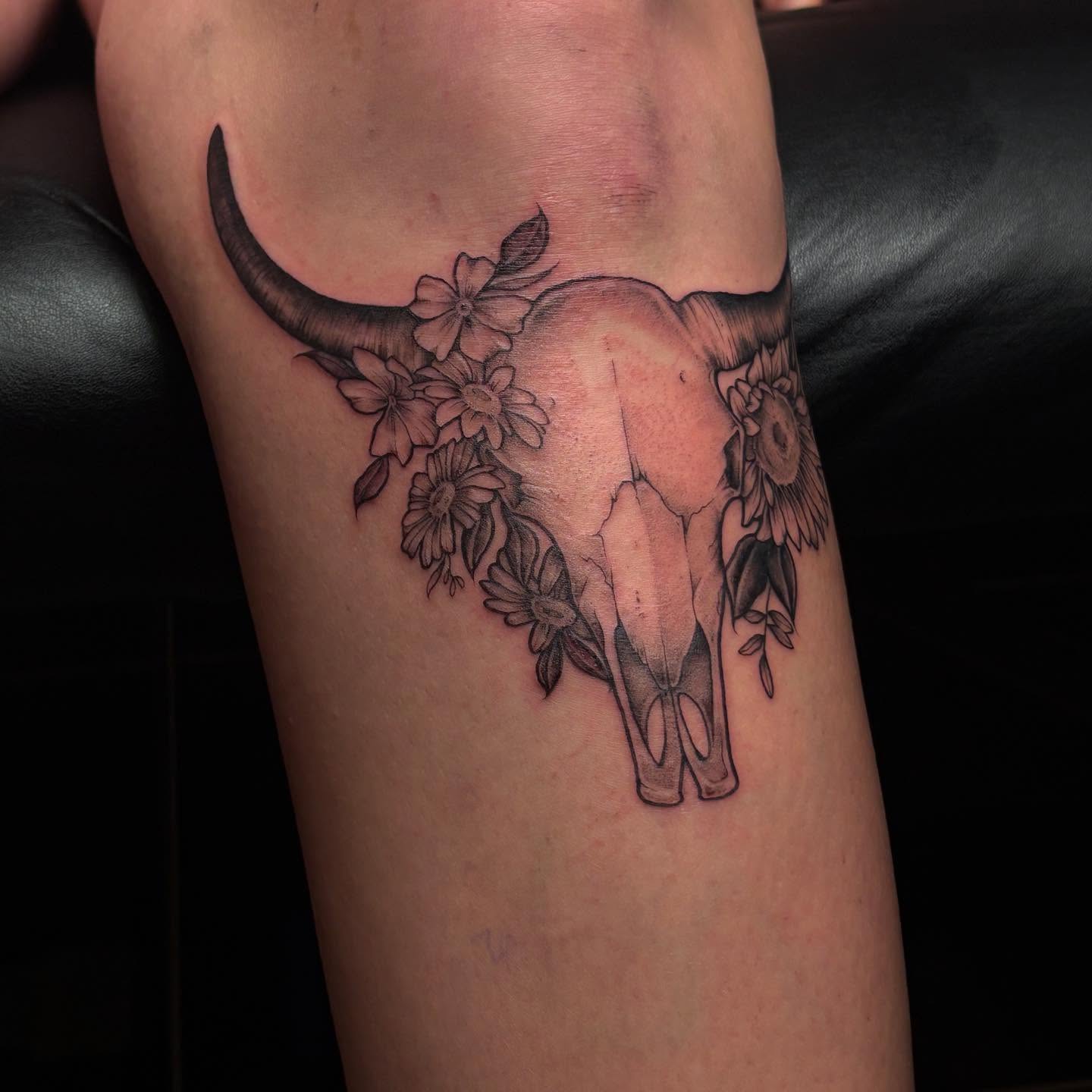 Bull skull with flowers realism tattoo on the forearm by amy mangeri ๐ฆ