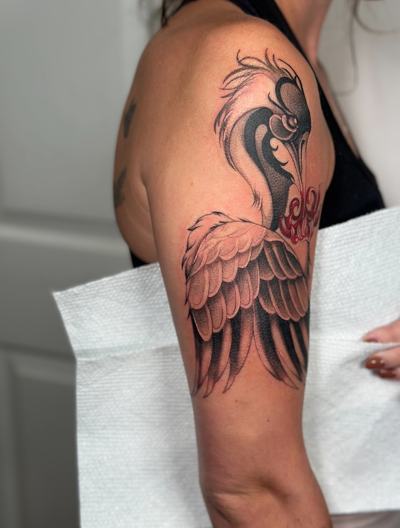Flamingo black and grey tattoo on the upper arm by Nashville Tattoo Artist - Nicolette Madlyne