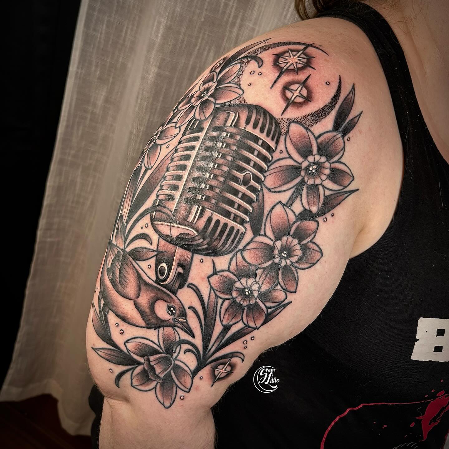 Microphone and flowers American traditional tattoo on the shoulder by 𝓢𝓪𝓶 𝓛𝓲𝓽𝓽𝓵𝓮