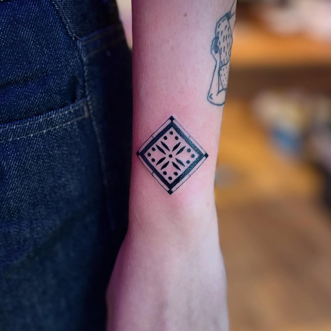 Tattoo by @flowers.for.all.occasions โ geometric, dotwork