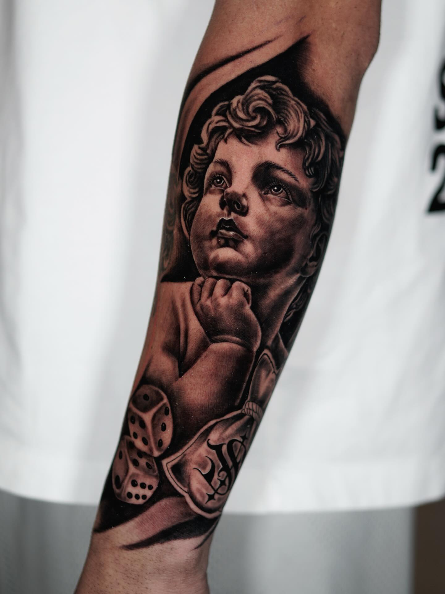 Tattoo by @gemmatattoooficiall — realism, black_and_grey