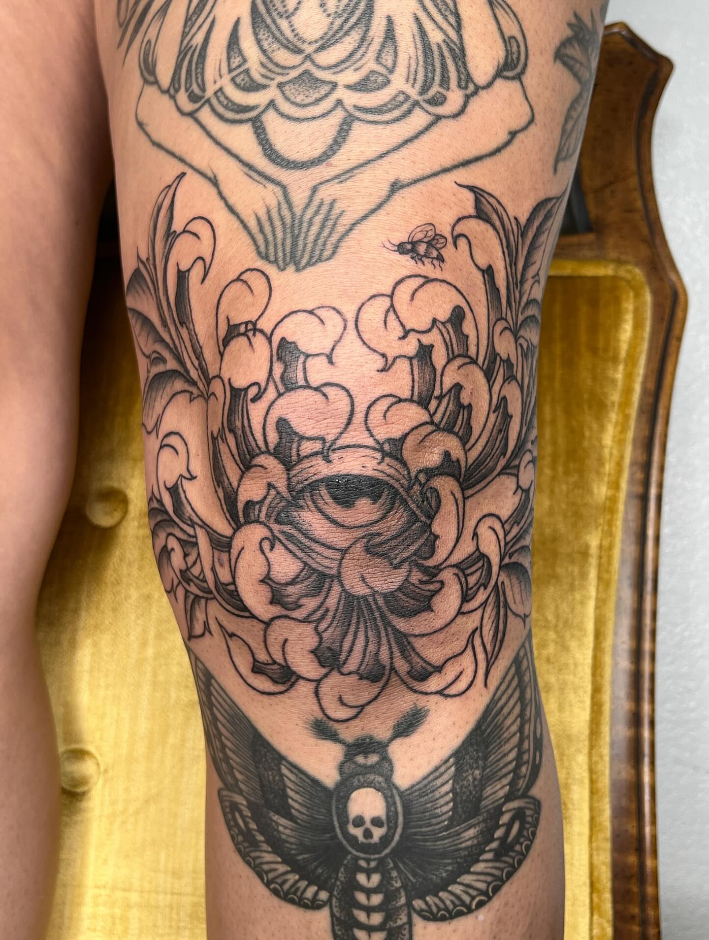 Eye and smoke American traditional tattoo on the forearm by Janelle McCarthy