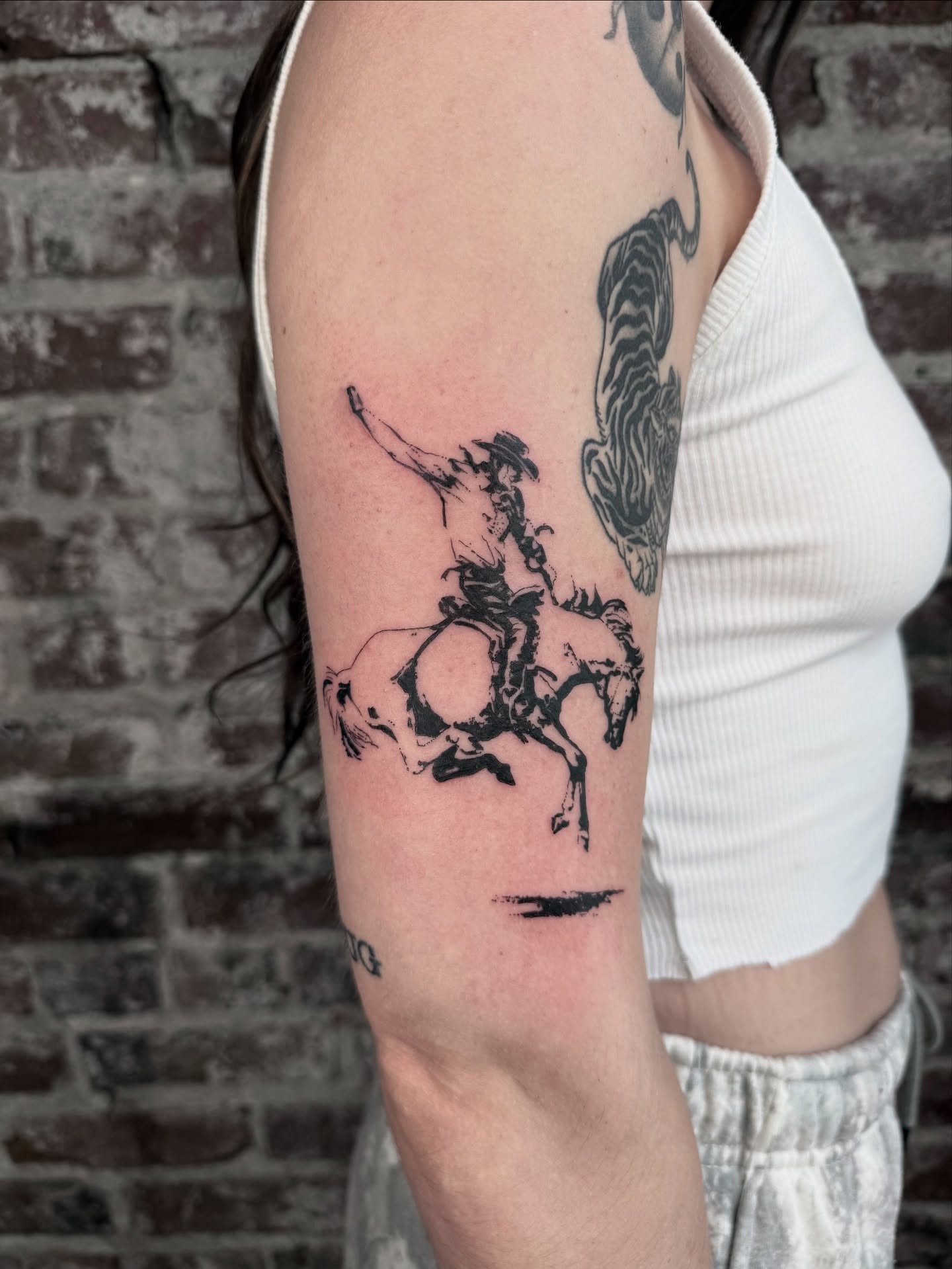 Cowboy riding horse black and grey tattoo on the forearm by ⊹ ࣪ ₊✩‧₊˚ 𝖘 𝖙 𝖊 𝖕 𝖍 𝖆 𝖓 𝖎 𝖊 ˚₊‧✩₊ ࣪ ⊹