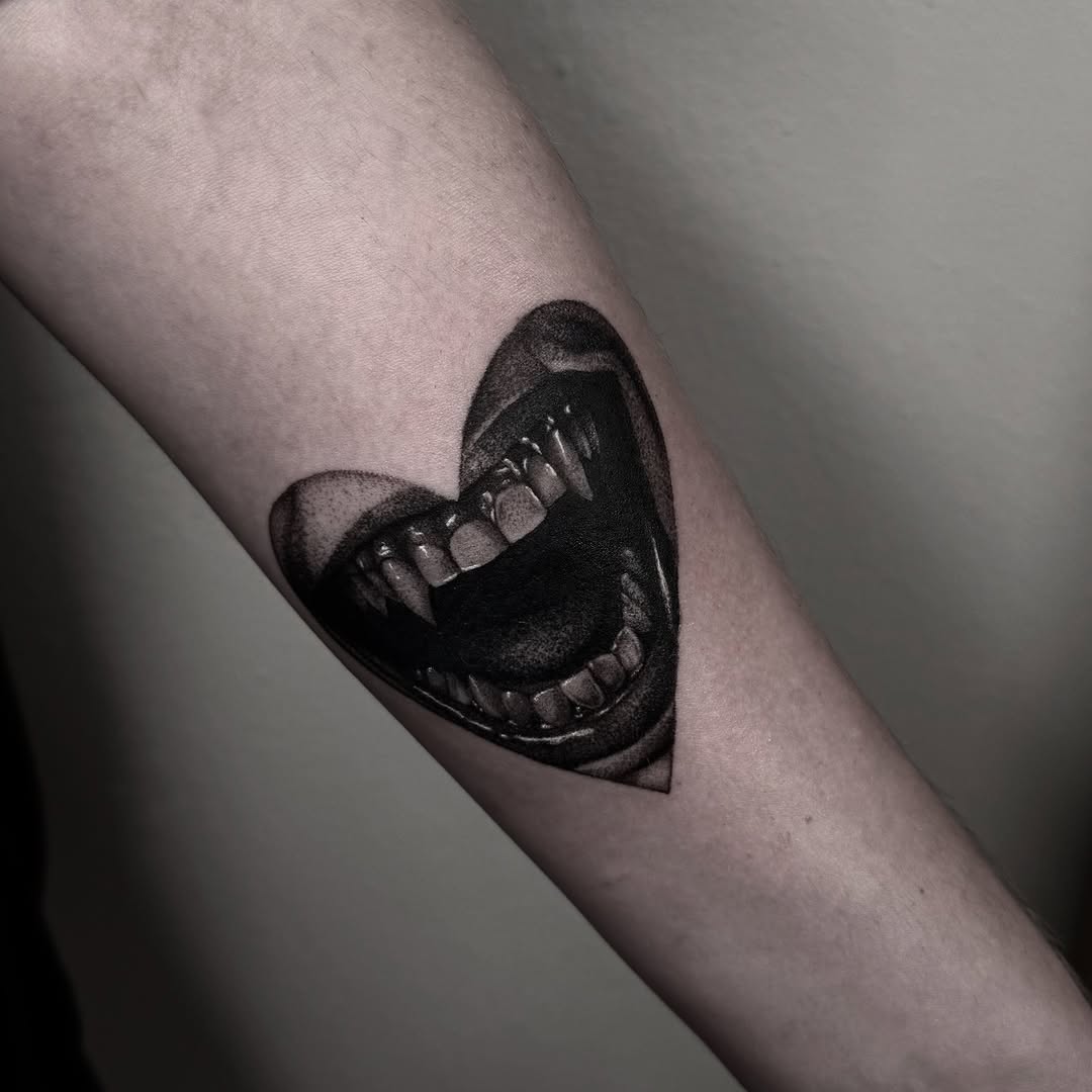 Vampire mouth in heart shape dark art tattoo on the forearm by Mara Flores βπΛβ§