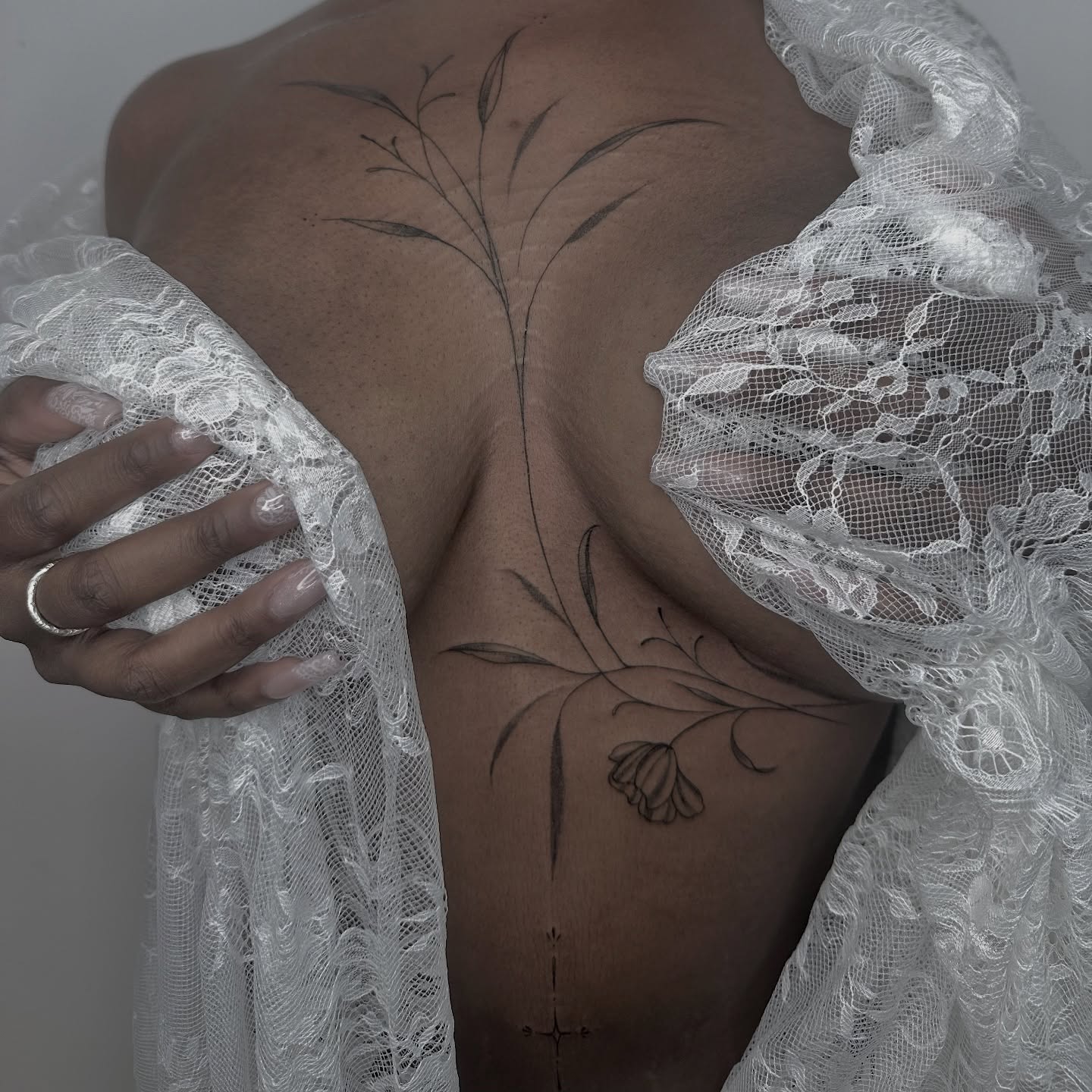 Flower and leaves black and grey tattoo on the back by 莹Fineline