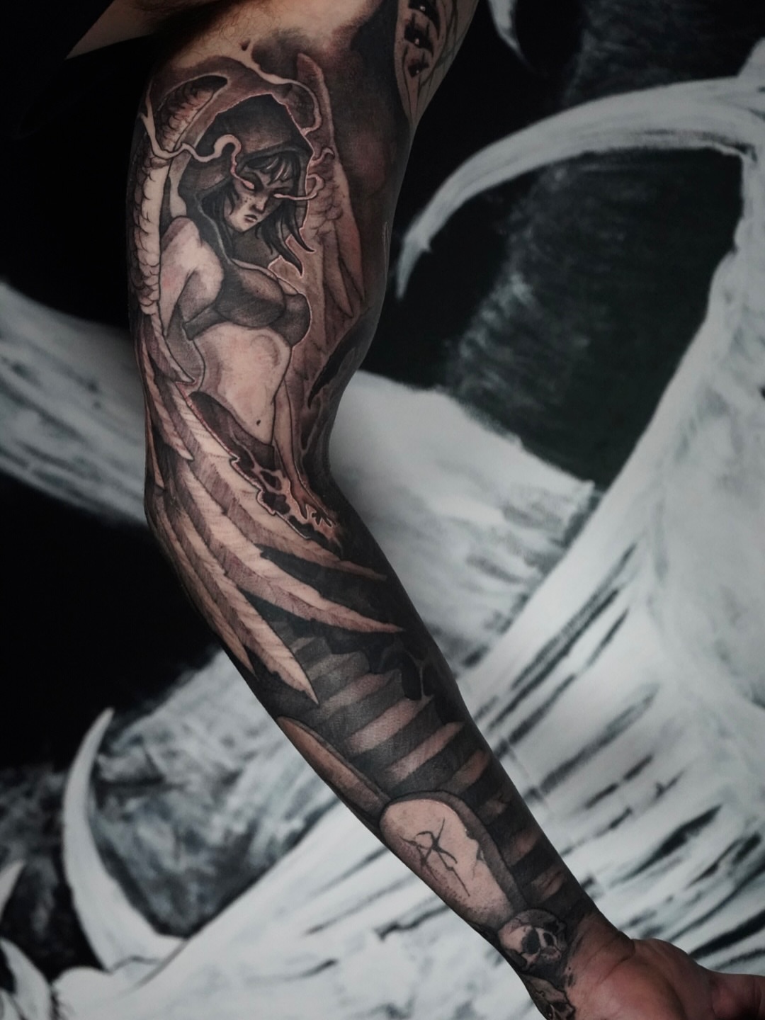 Woman with snake realism tattoo on the forearm by Jamie