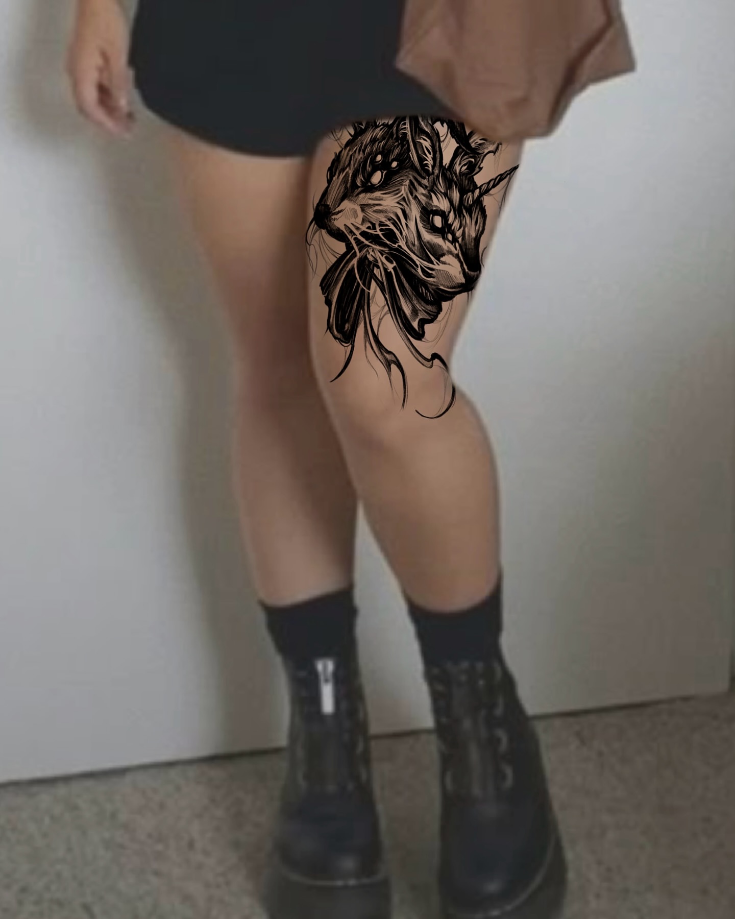Unicorn black and grey tattoo on the thigh by Bruna Bianculli