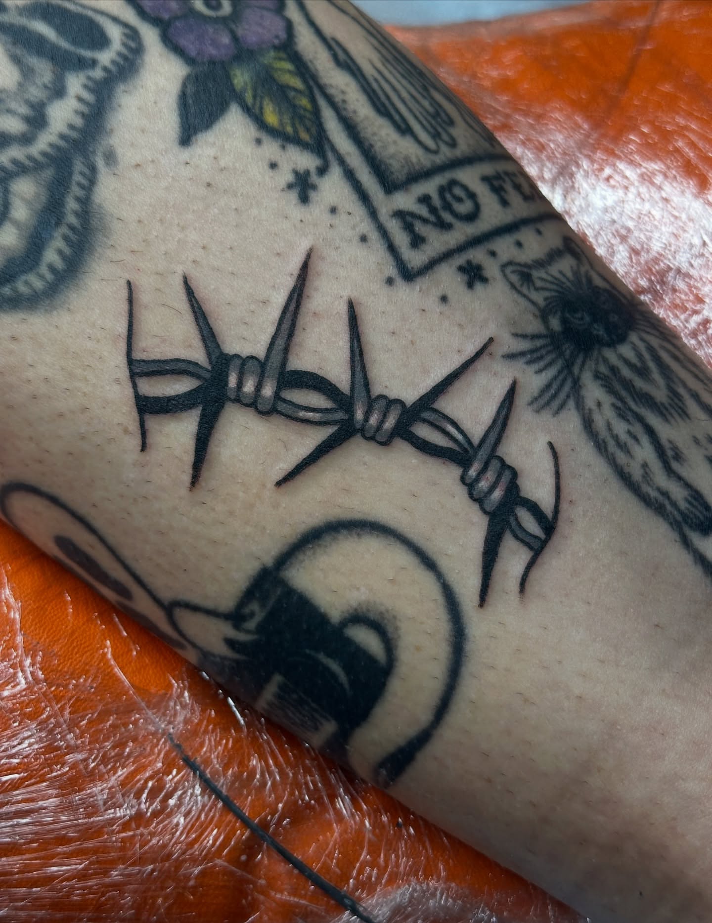 Barbed wire black and grey tattoo on the forearm by julian solis, Houston, Texas