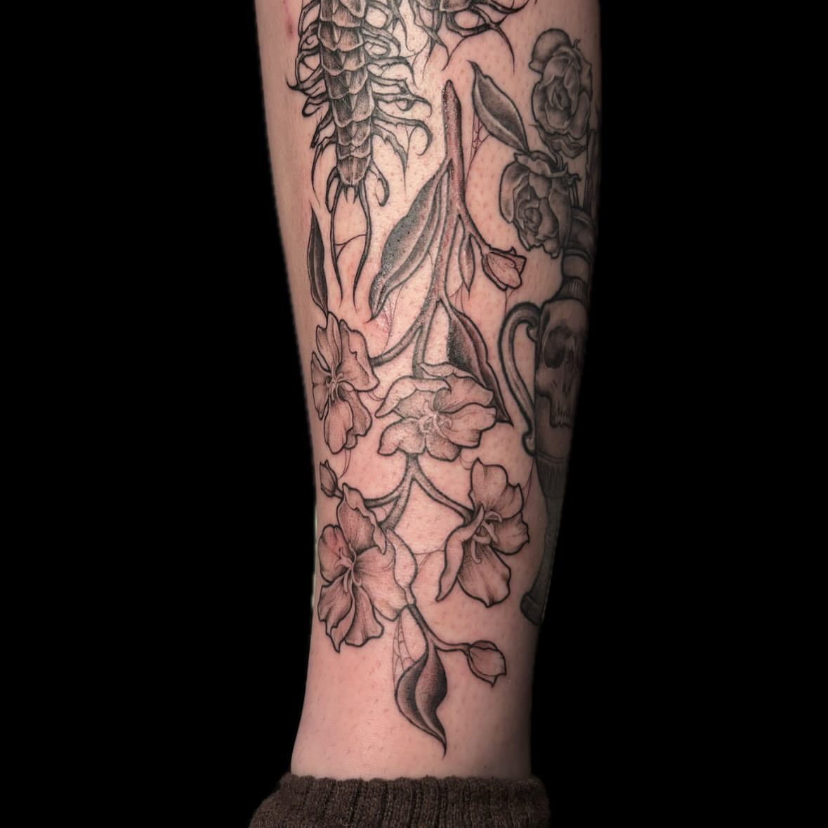 Floral arrangement black and grey tattoo on the forearm by amy mangeri ๐ฆ