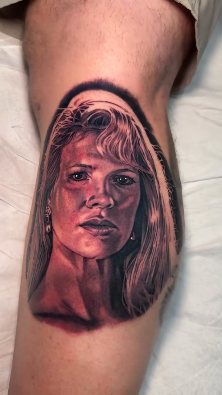 Portrait of a woman realism tattoo by Bradley Dozier