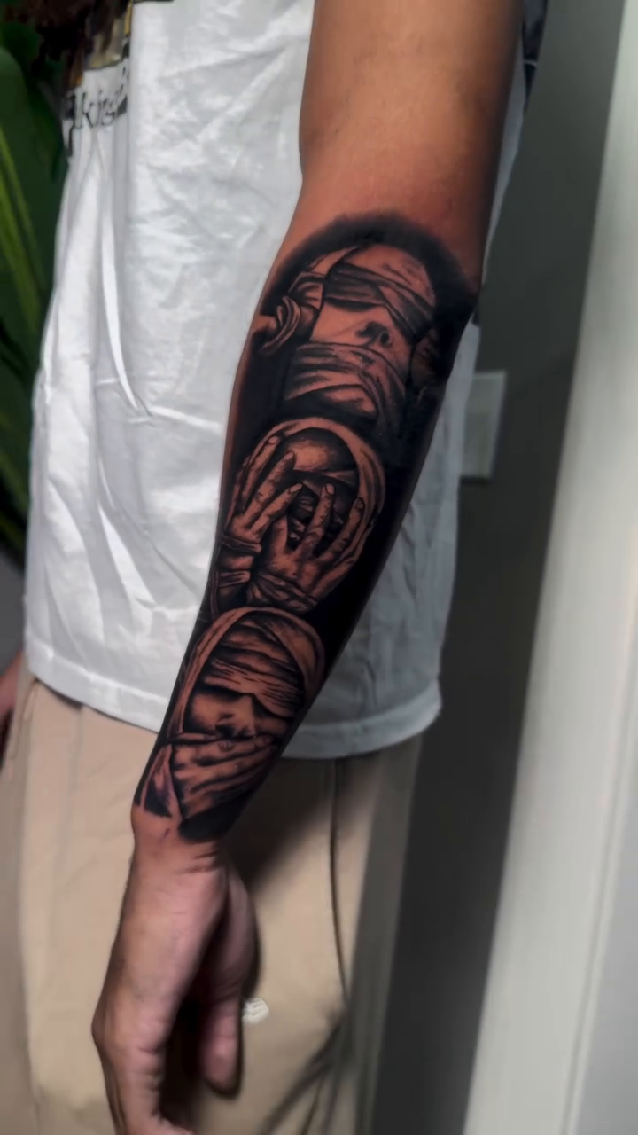 Mummy and clock realism tattoo by caleb coley