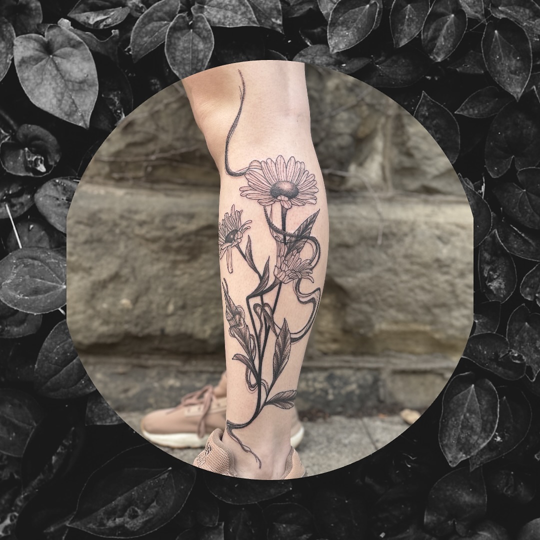 Botanical flowers realism tattoo on the calf by Sydney