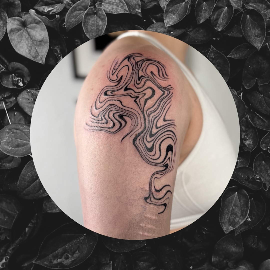 Swirl pattern black and grey tattoo on the shoulder by Sydney