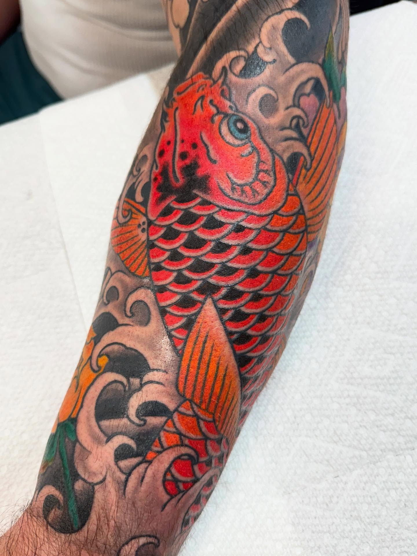 Koi fish japanese irezumi tattoo on the forearm by Cole Pittman Memphis Tattoo artist, Memphis, Tennessee