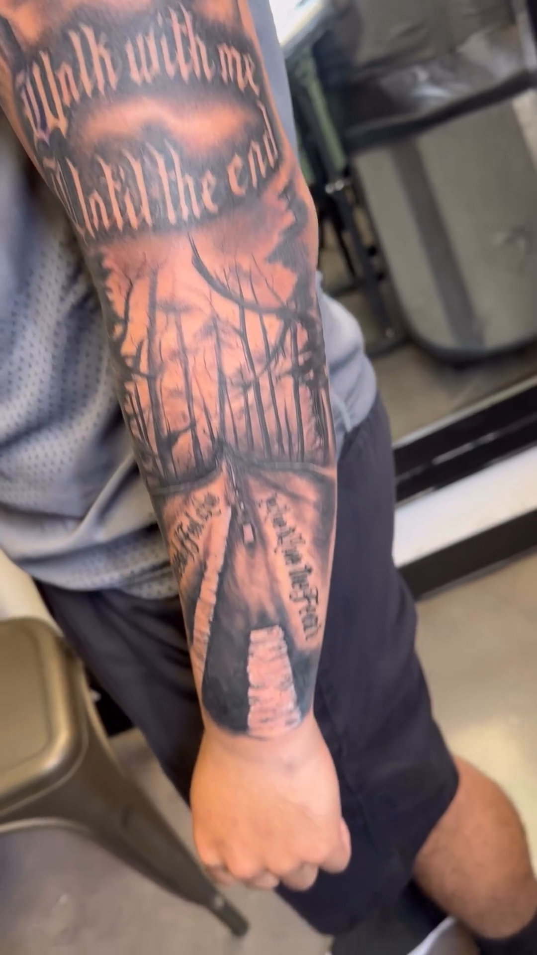 Forest scene with text realism tattoo by Ricky Flemate, San Antonio
