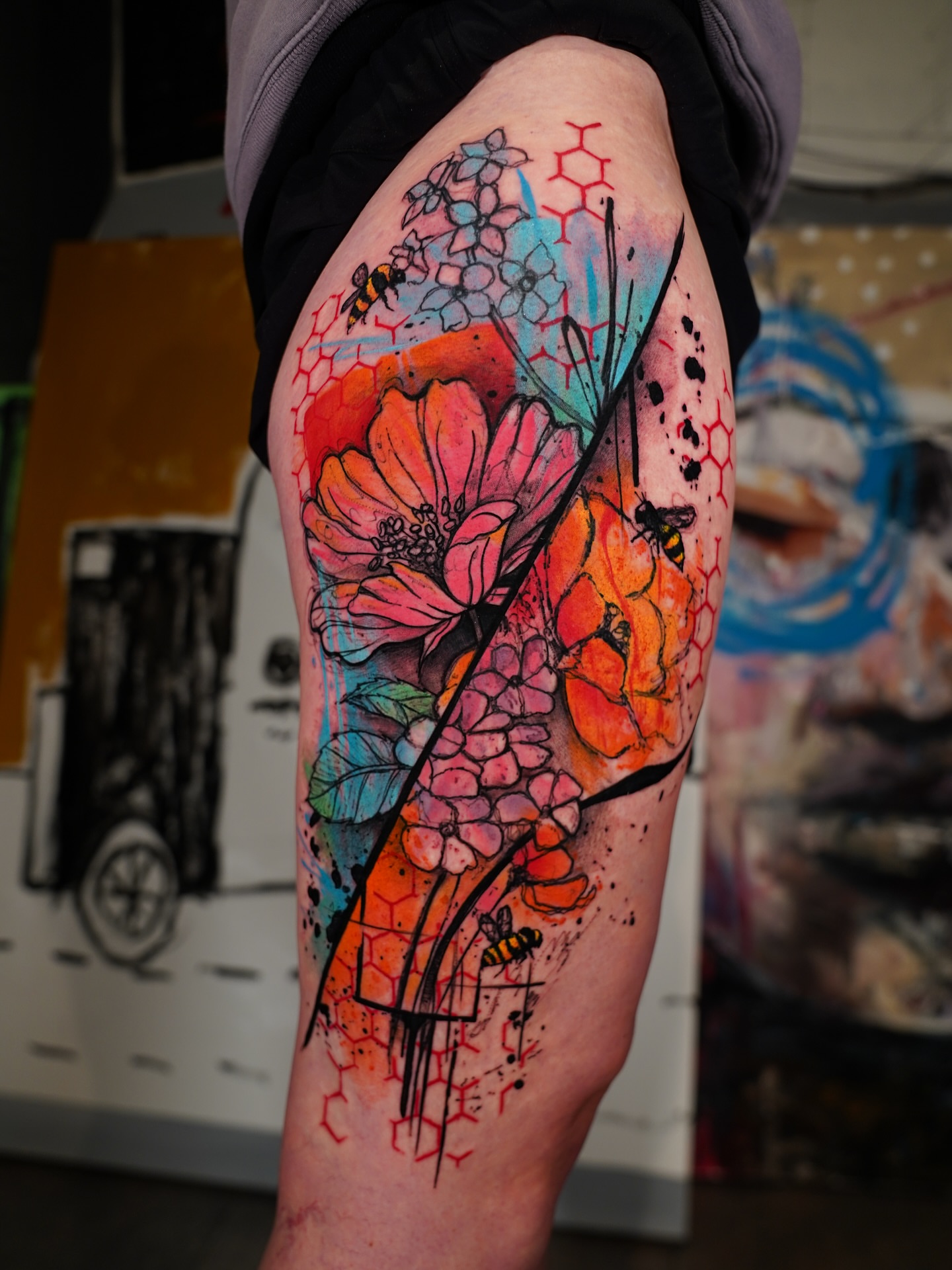 Flowers and bees watercolor tattoo on the forearm by Georgios Papadopoulos Tattoo Artist Los