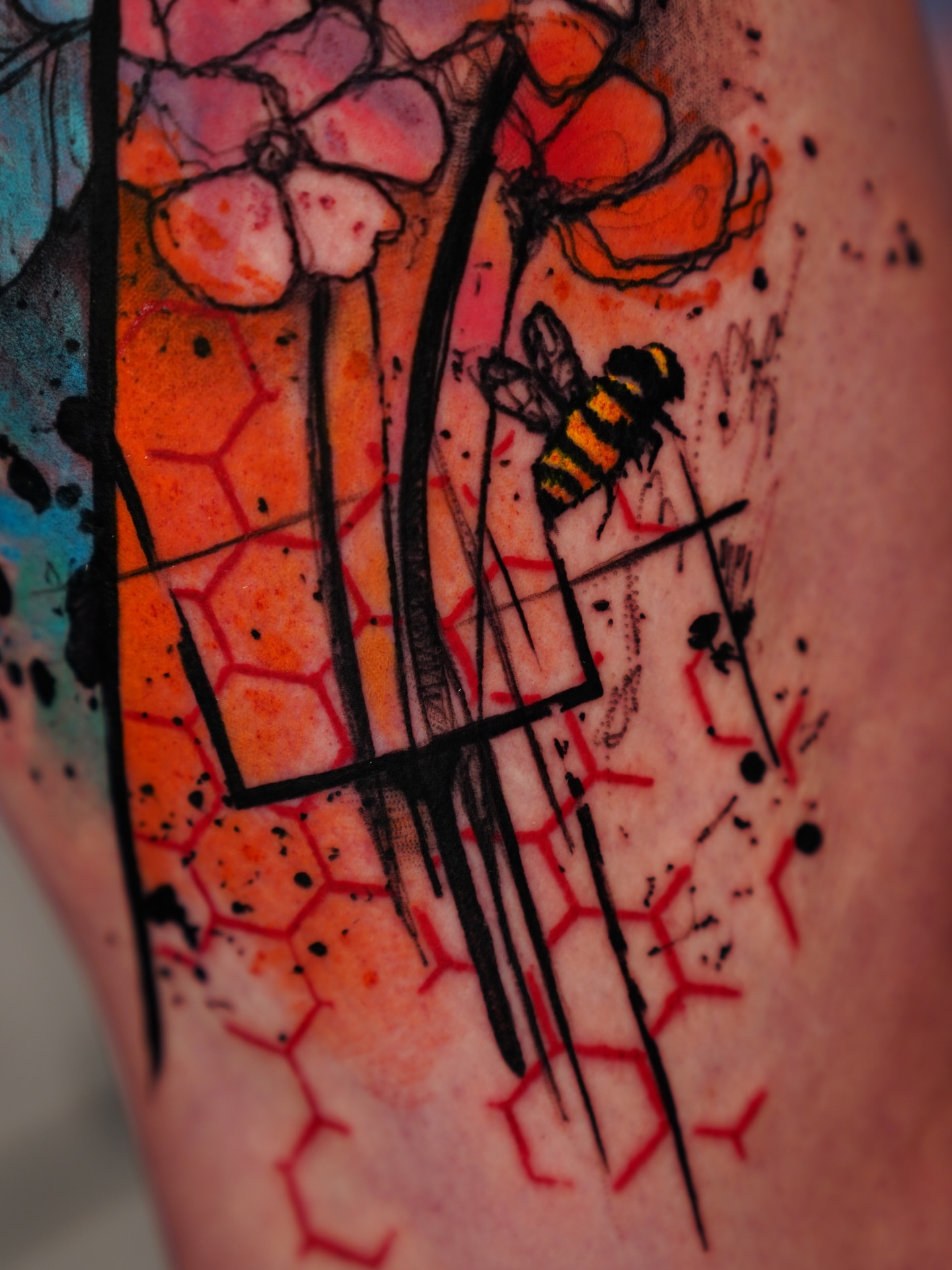 Bee and flowers geometric tattoo on the forearm by Georgios Papadopoulos Tattoo Artist Los