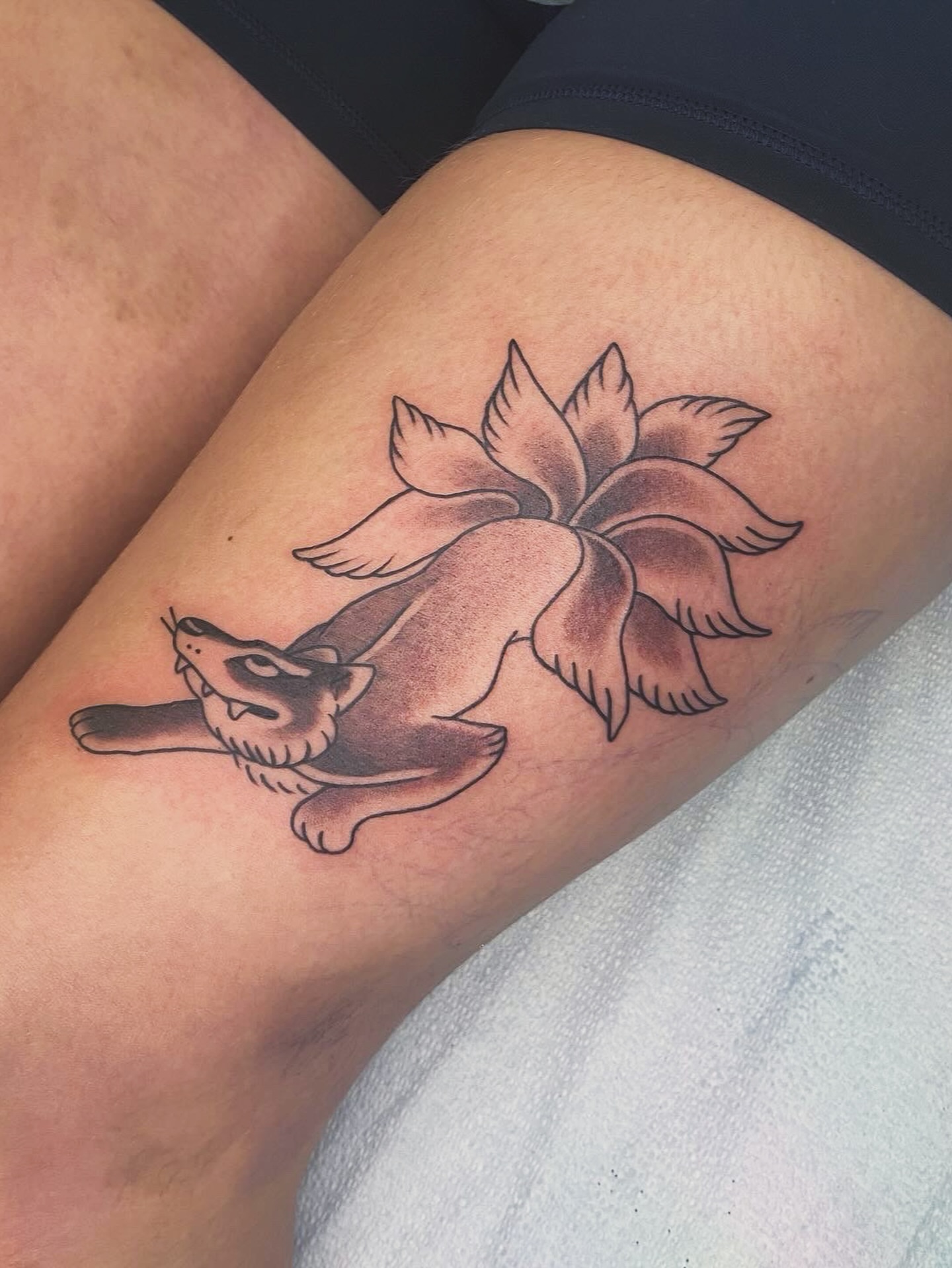 Fox and lotus black and grey tattoo on the thigh by Las Vegas Tattoo Artist π€ Nani
