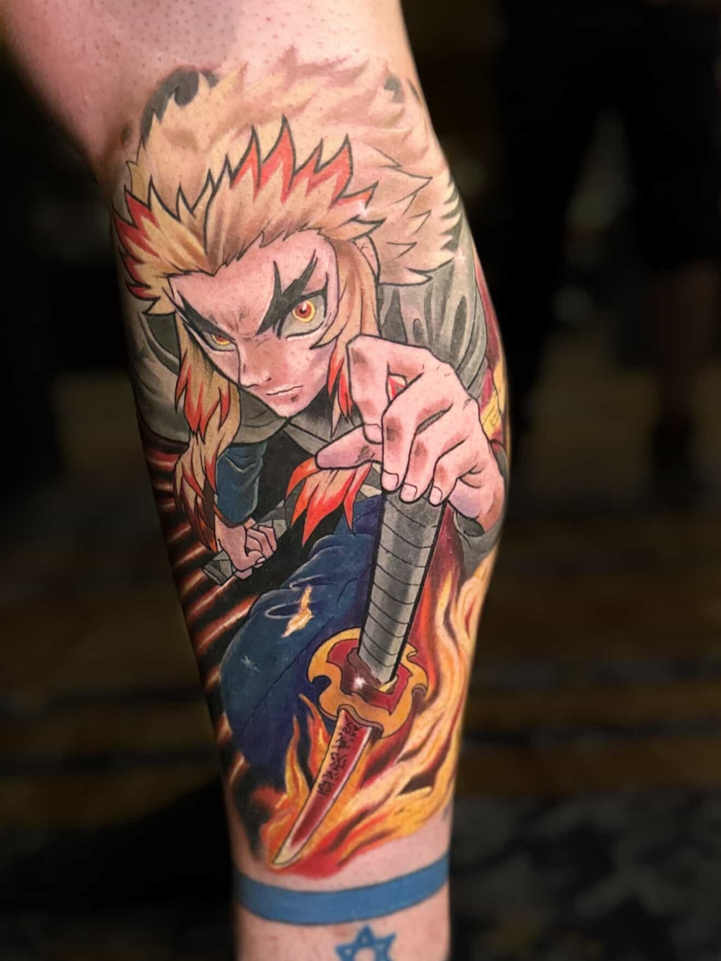 Anime character with sword anime tattoo on the forearm by Ksu Storm, San Francisco, California