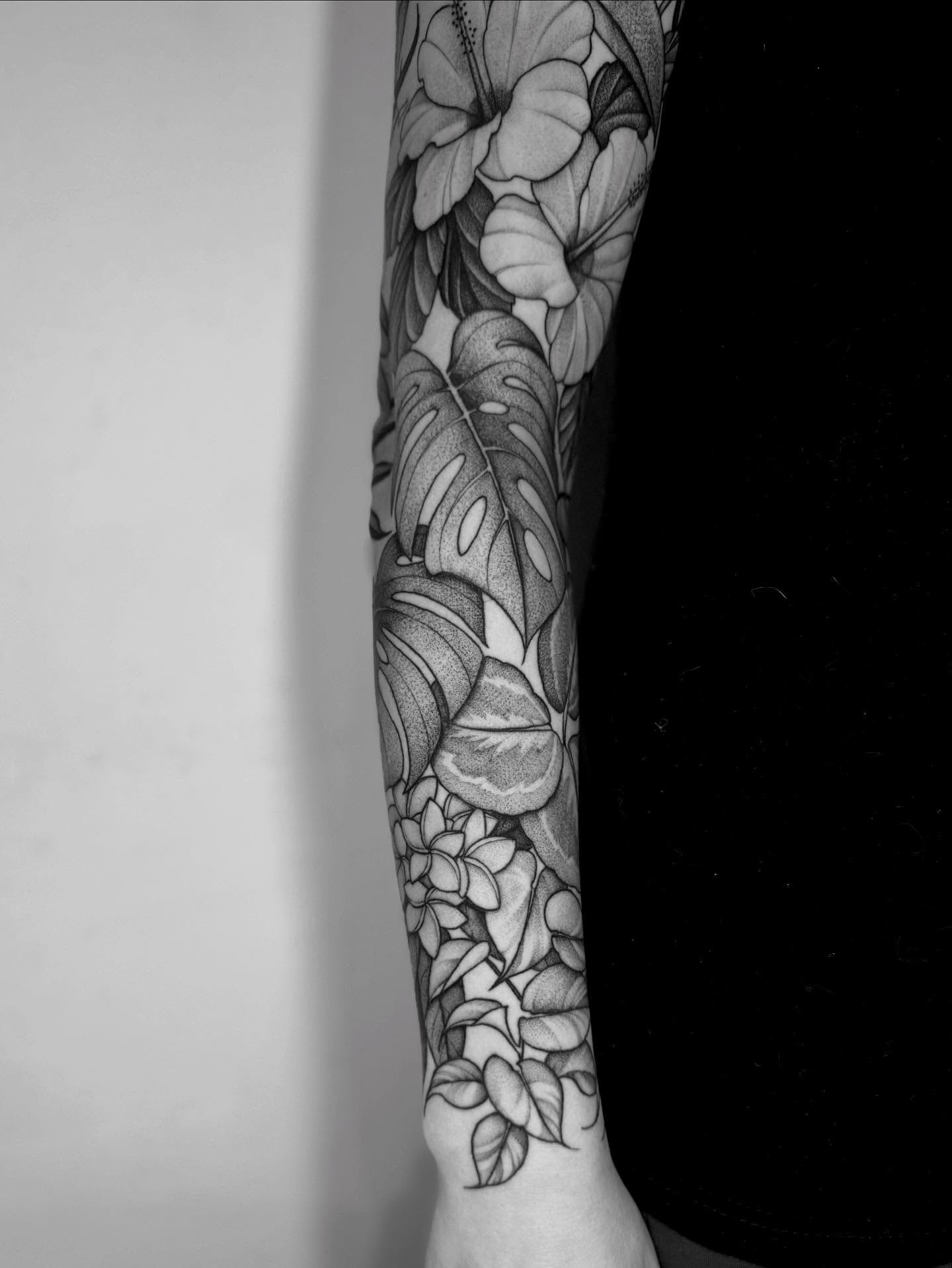 Floral design dotwork tattoo on the forearm by Lauren Llerandi