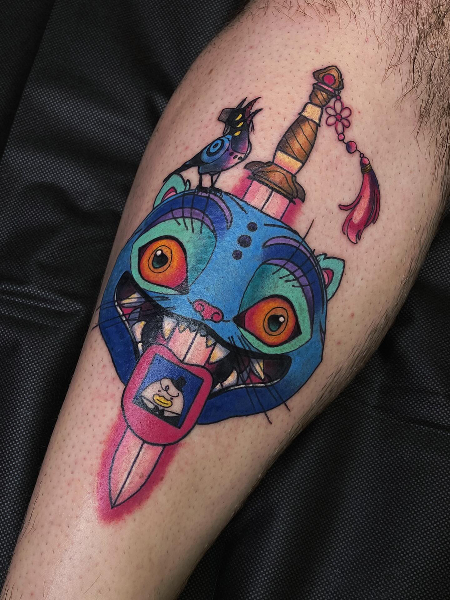 Cat head new school tattoo on the thigh by @kaitlin.tattoos, Richmond, Virginia