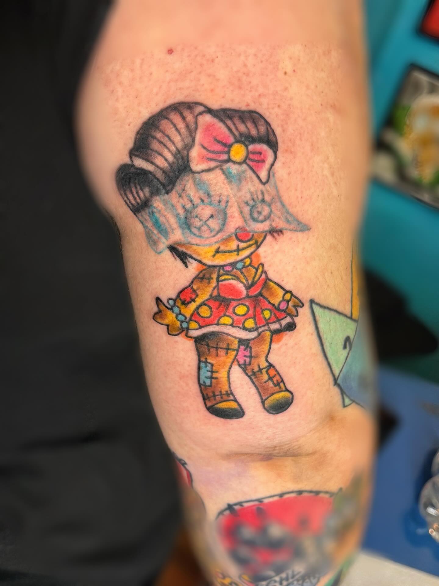 Doll American traditional tattoo on the forearm by @brocks_tatt_attic_, New Orleans, Louisiana