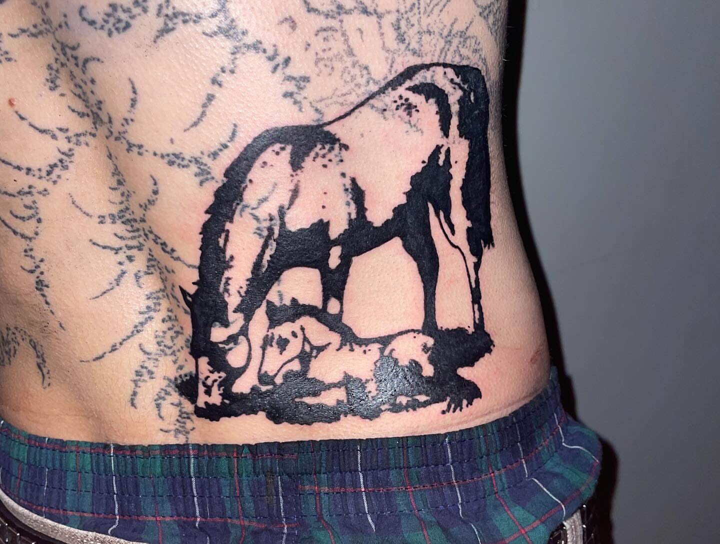 Bear black and grey tattoo on the torso by @emotionalthugtattoo