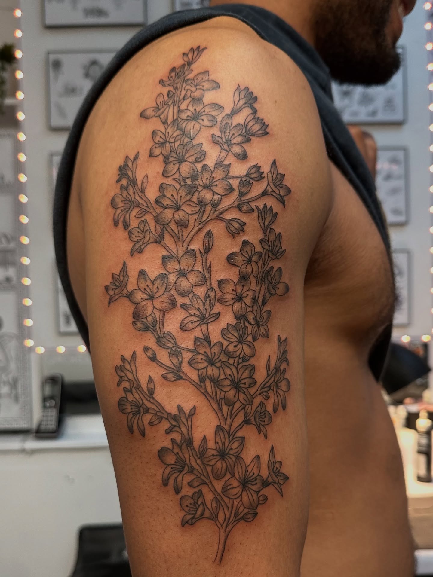 Flower bouquet black and grey tattoo on the shoulder by Piccolino, Cambridge, Massachusetts