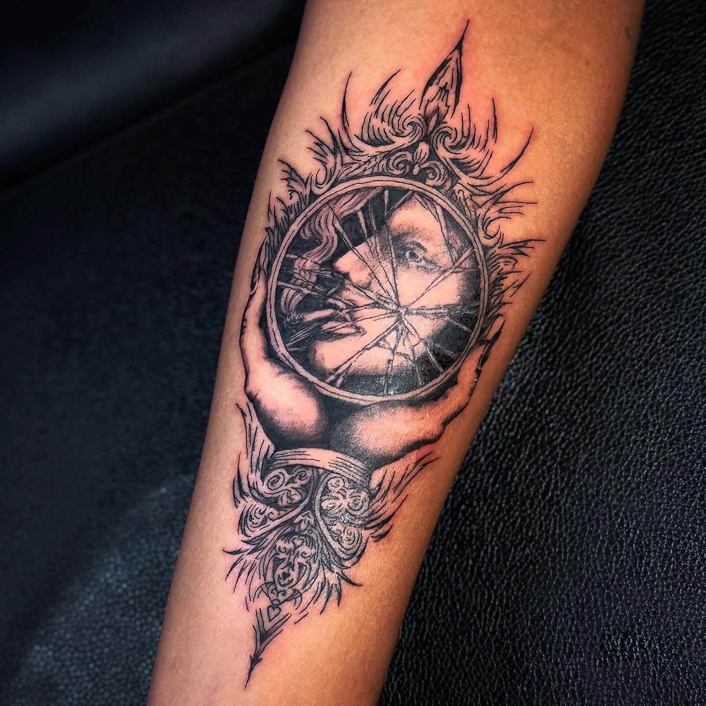 Abstract face geometric tattoo on the forearm by Cullen-Lee