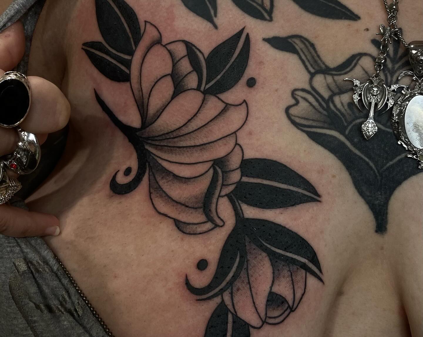 Rose black and grey tattoo on the chest by Kiera ❤️‍🔥