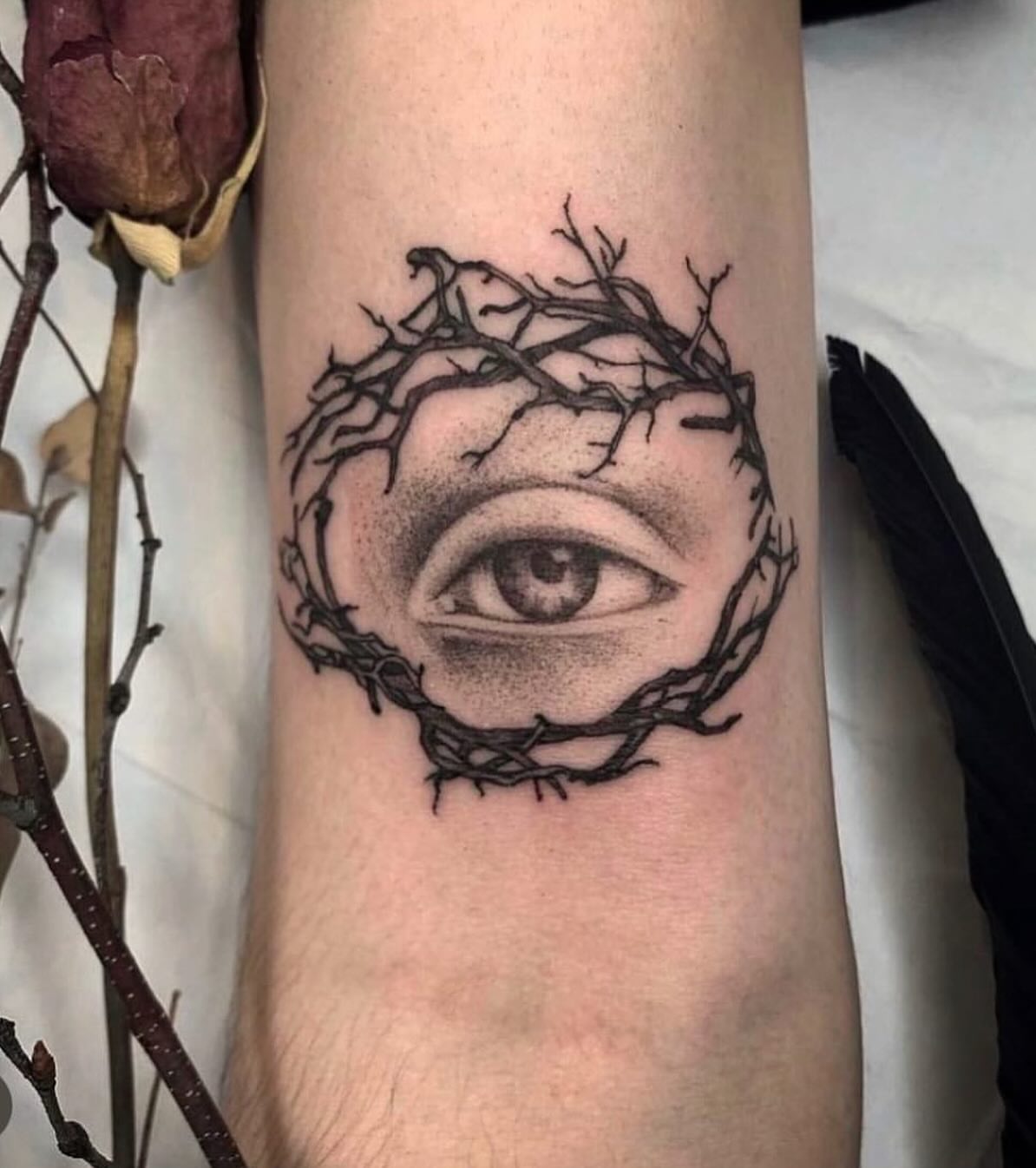 Eye within thorns dotwork tattoo on the forearm by Jamie Draven 🐺