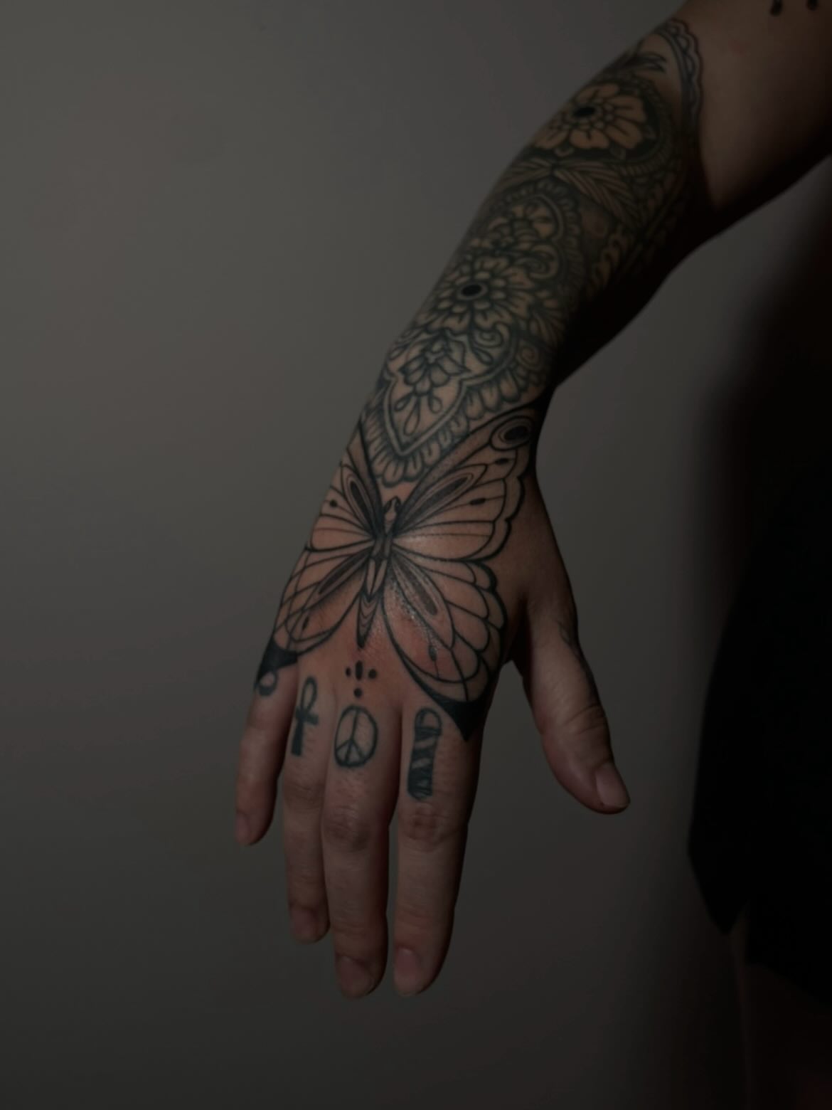 Butterfly black and grey tattoo on the hand by Danika Brooke 🧿