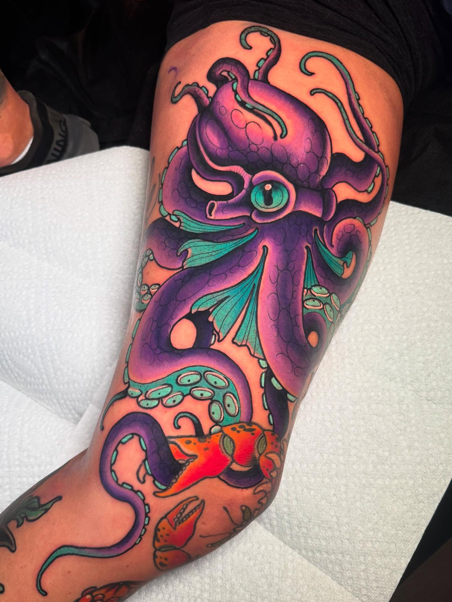 Octopus new school tattoo on the thigh by Jess Longfield, Des Moines, Iowa