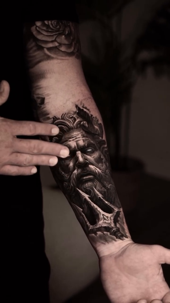 Greek god portrait realism tattoo by Luis Bravo