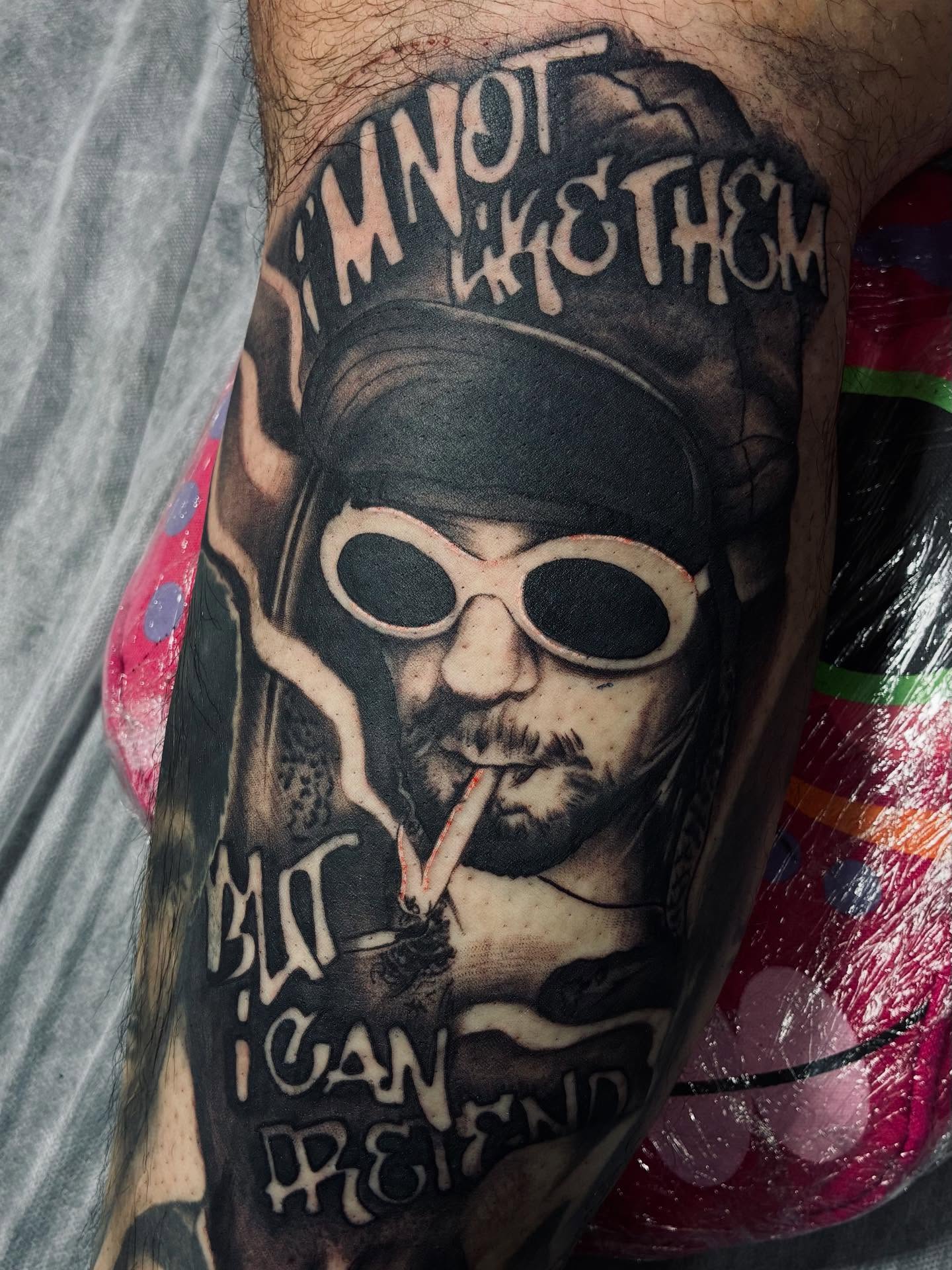 Smoking man realism tattoo on the forearm by Nessa, Las Vegas, Nevada