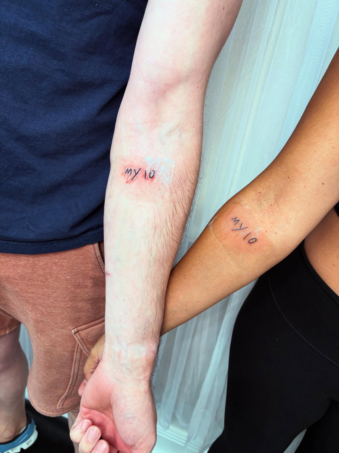 Myio lettering script tattoo on the forearm by Victoria Cooper