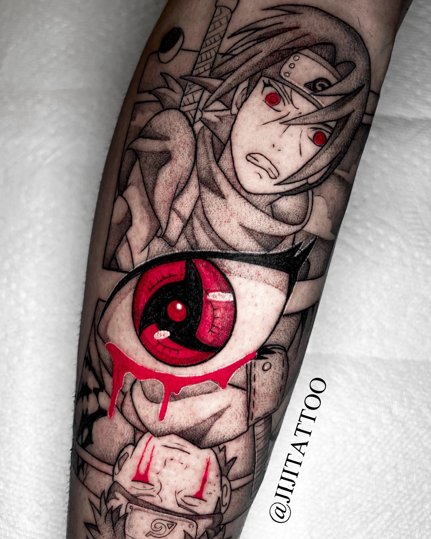 Anime character with Sharingan eye anime tattoo on the forearm by 🇰🇷jijitattoo 🇺🇸