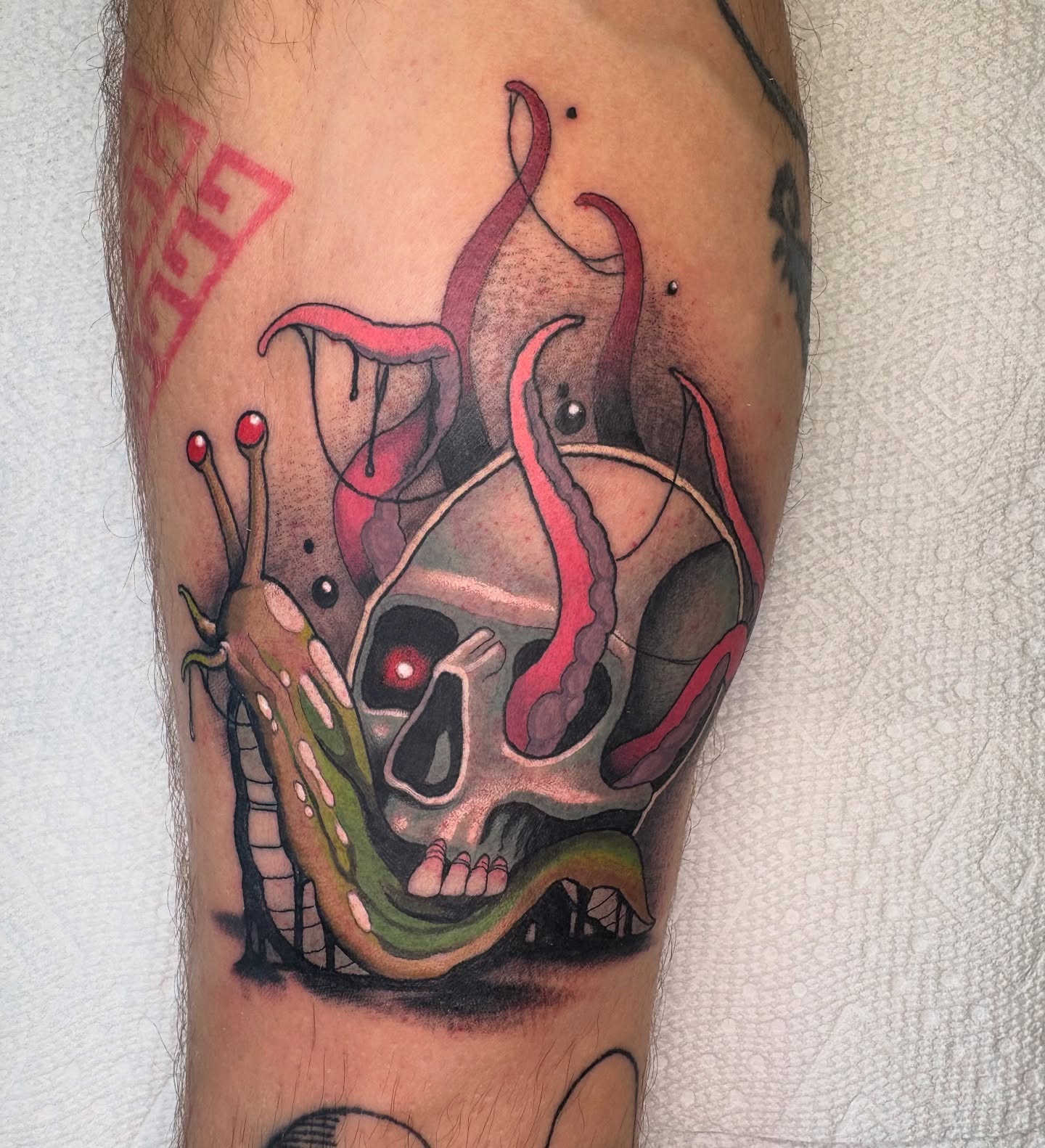 Skull with tentacles dark realism tattoo on the forearm by Seattle Tattoo Artist, Bonney Lake, Washington