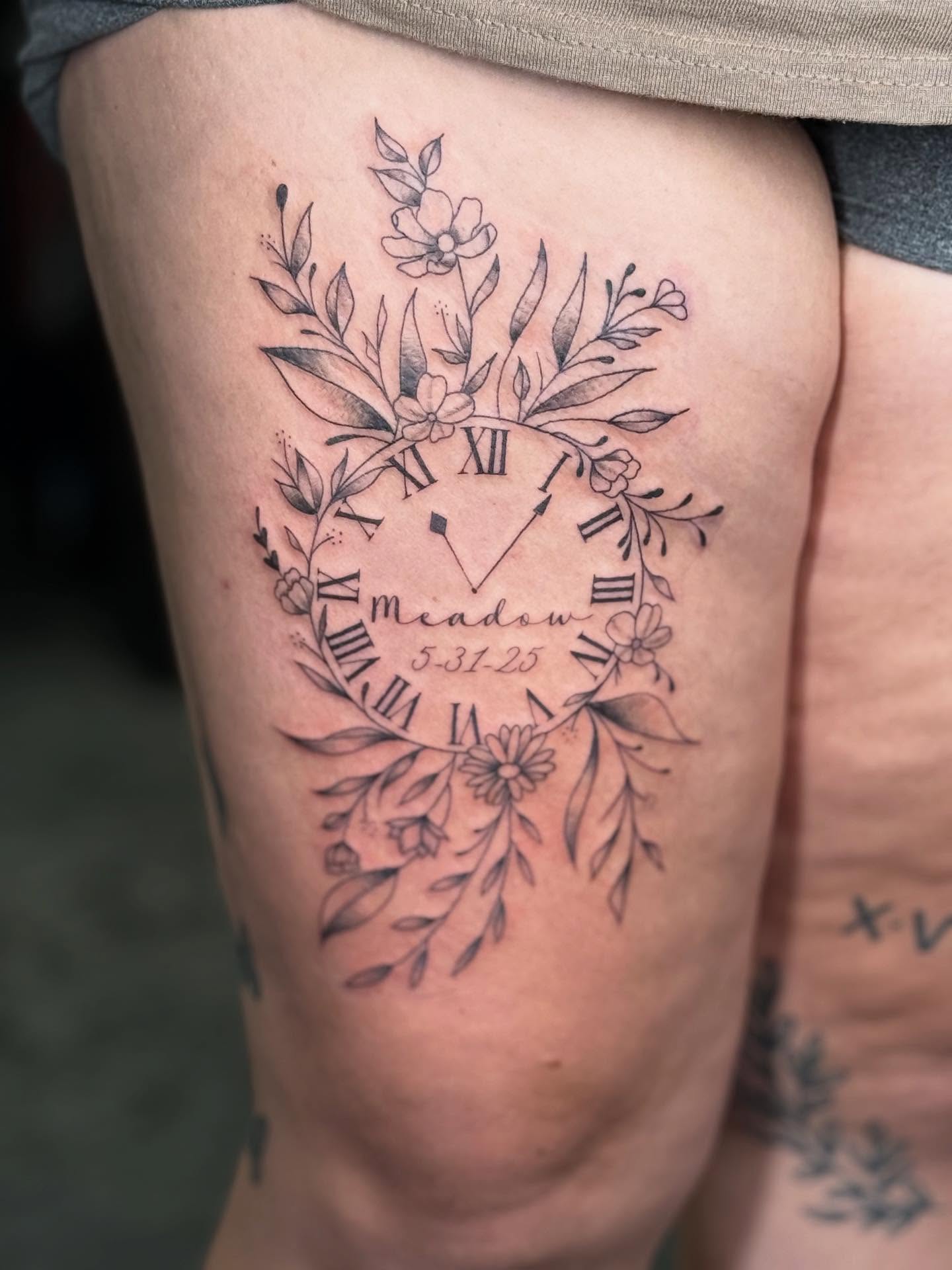 Clock with floral wreath fine line tattoo on the thigh by ✨ Jess ✨, Moncks Corner, South Carolina