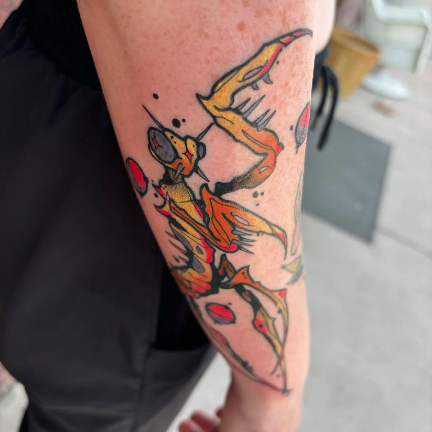 Fire dragon American traditional tattoo on the forearm by Ghost Ham Tattoos