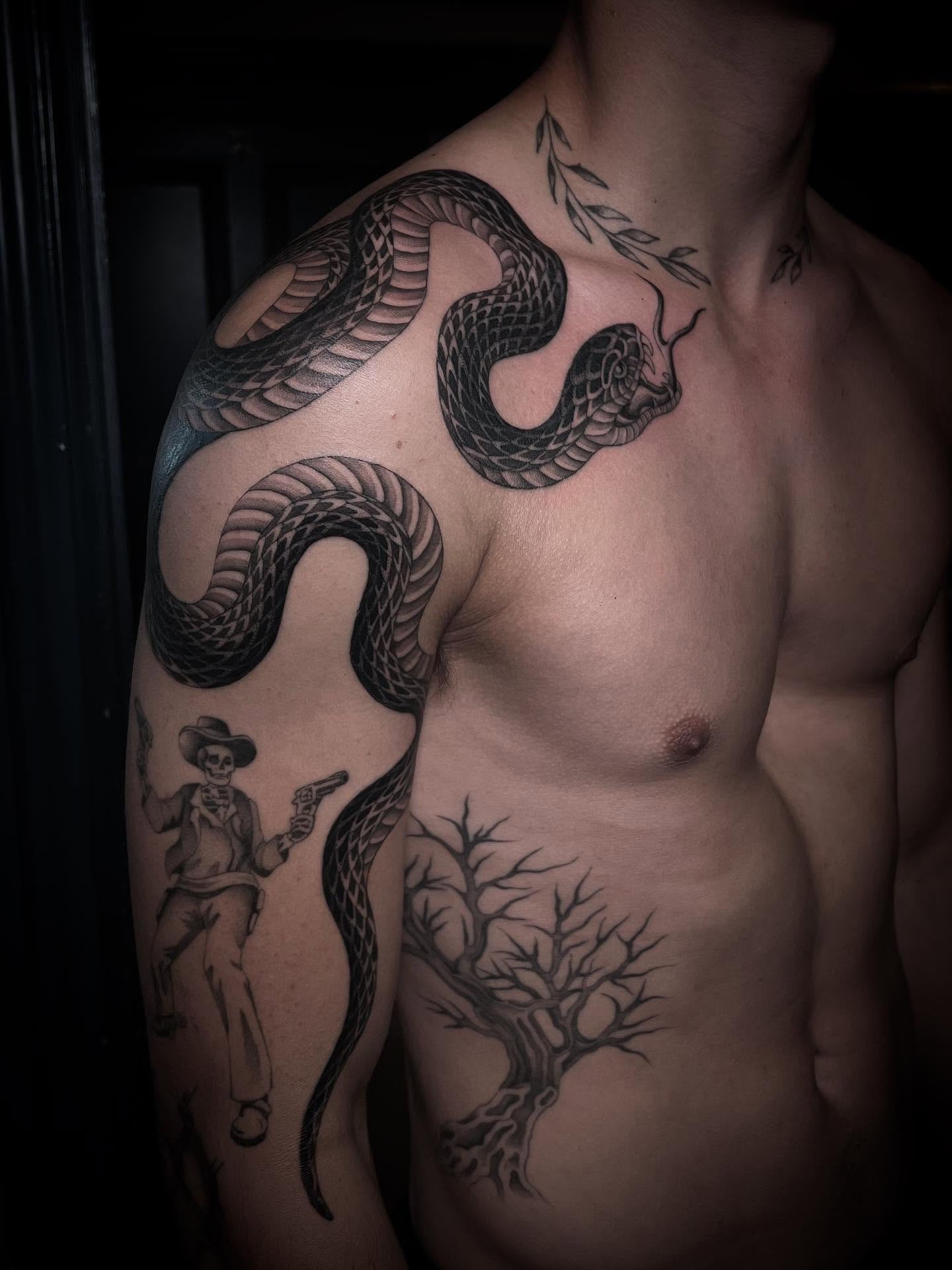 Snake and tree black and grey tattoo on the chest by linahsiaotattoo