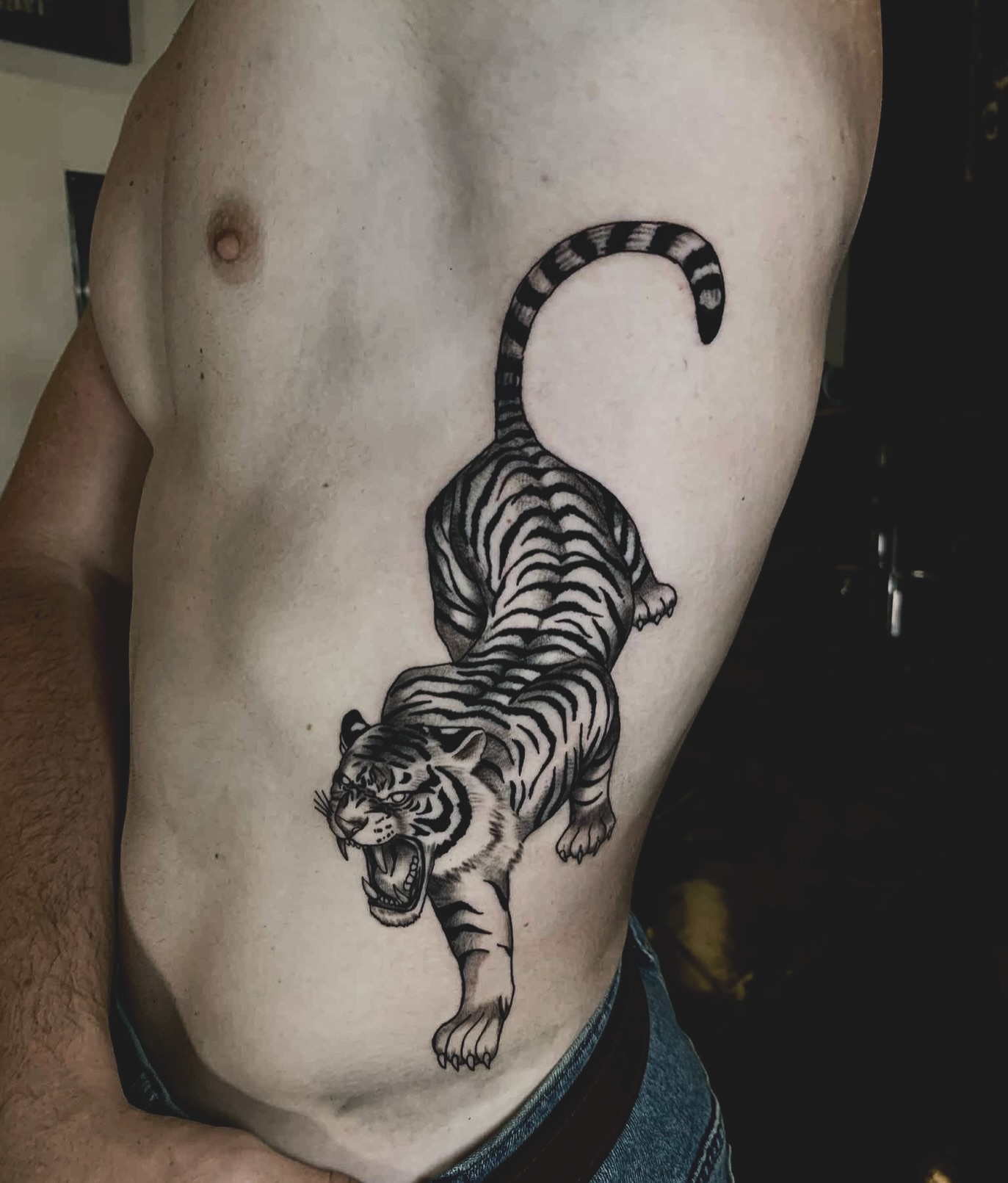 Tiger black and grey tattoo on the ribs by V